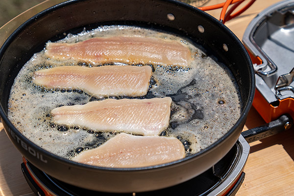 Cooking up some freshly caught trout