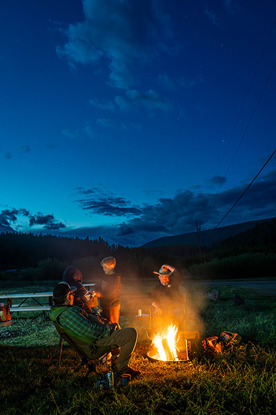 The family hanging around the camp fire